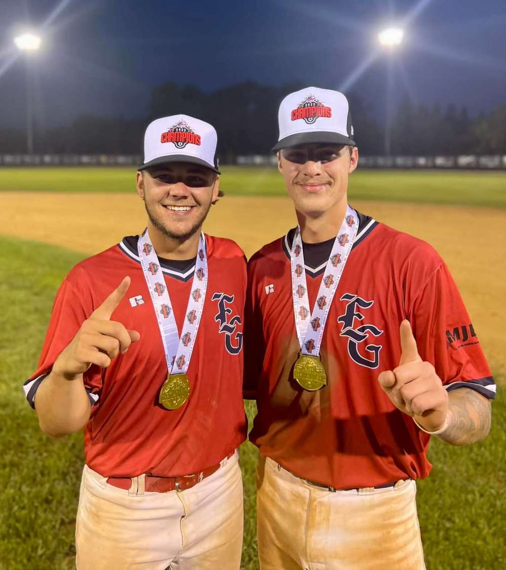 Rylan Penner and Cody Gunderson were all smiles after winning gold medals with the Elmwood Giants at the 22U Canadian Championships. (Carillon Sultans Facebook)