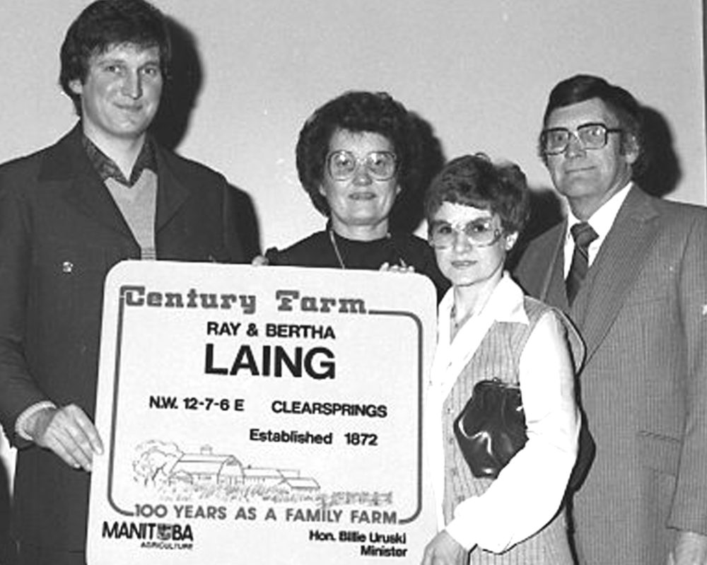 WES KEATING CARILLON ARCHIVES
Ed, Alice, Ray and Bertha Laing display the new century farm sign they received in 1982 to officially acknowledge a fourth generation of Laings at Laingspring.