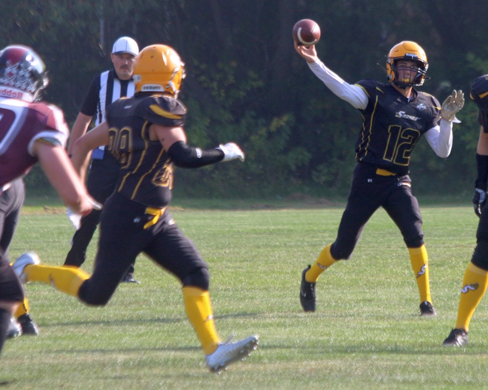 Bradey Dornez lets a pass go during the first half of Steinbach's pre-season game against Springfield. (Cassidy Dankochik The Carillon)