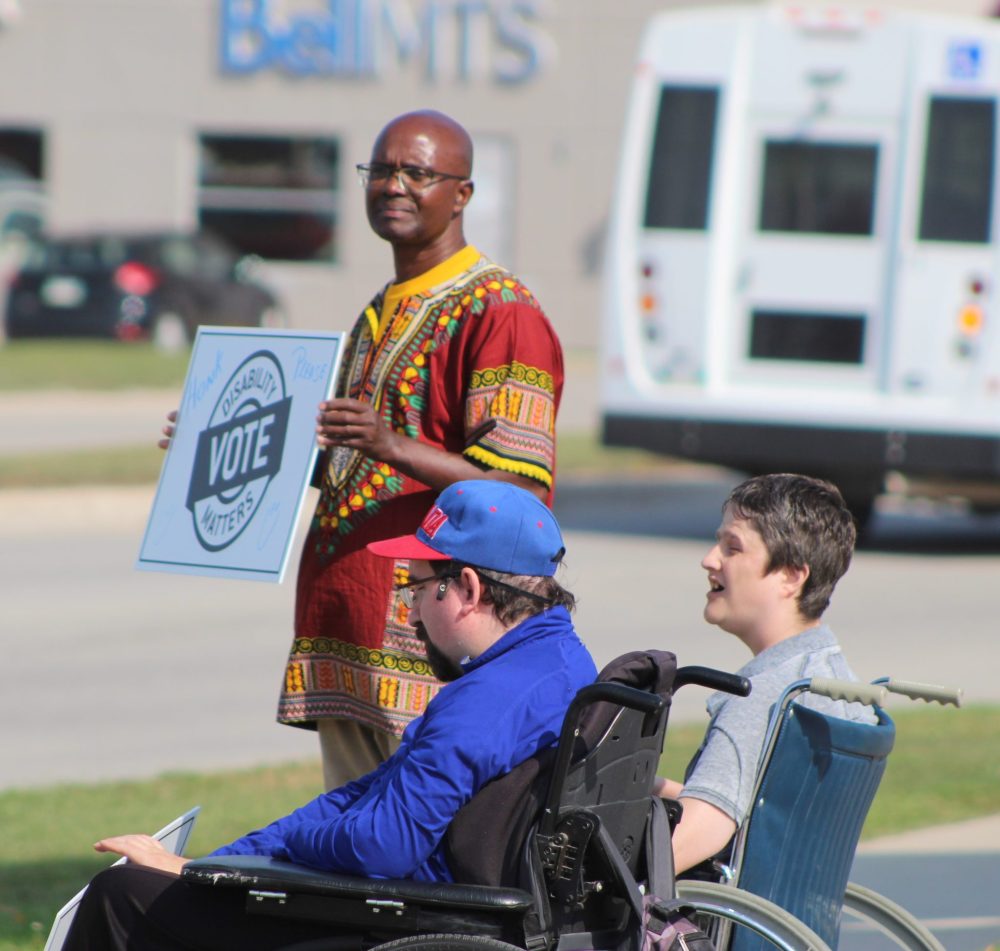 CHRIS GAREAU THE CARILLON
Supporters for disability rights get honks of support from passing motorists at Brandt and Main Streets as part of a province-wide rally by Disabilities Matters Vote Sept. 19 to get voters thinking about their issues ahead of the Oct. 3 election.