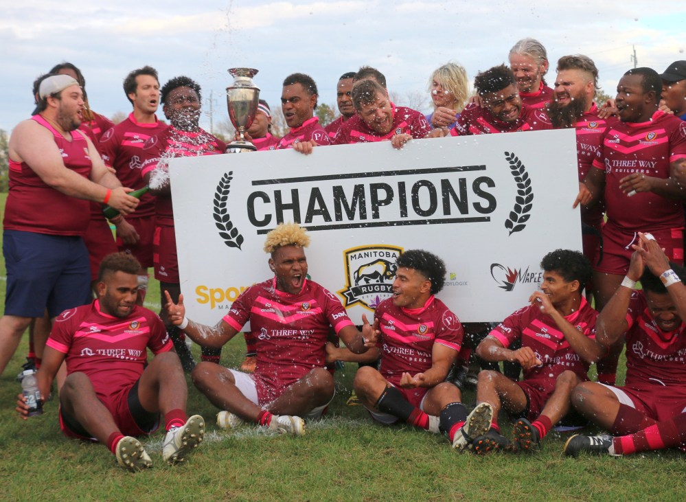 Eastman Warriors staff broke out the Champagne after the team became the first from outside Winnipeg to win the top prize for Manitoba Rugby. (Cassidy Dankochik The Carillon)