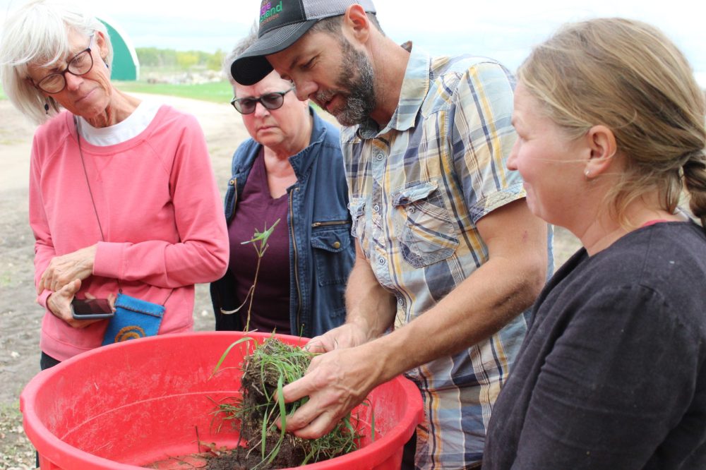 CHRIS GAREAU The Carillon
Guy Bouchard teaches principles of good soil maintenance during the experiential tourism visit at his Green Pastures farm.