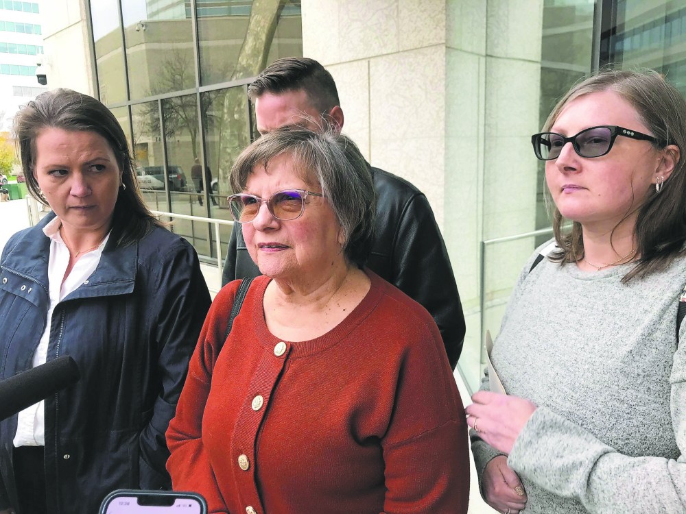 DEAN PRITCHARD / WINNIPEG FREE PRESS
Candyce Szkwarek (centre) speaks to reporters outside court Tuesday after a judge declared her attacker Trevor Farley not criminally responsible for his actions.
October 17, 2023