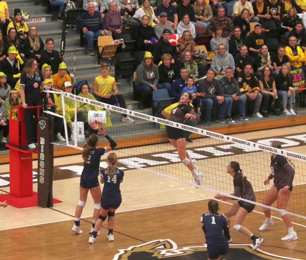Sienna Driedger goes for a kill during the Manitoba High School Athletic Association AAAA varsity finals. (Cassidy Dankochik The Carillon)