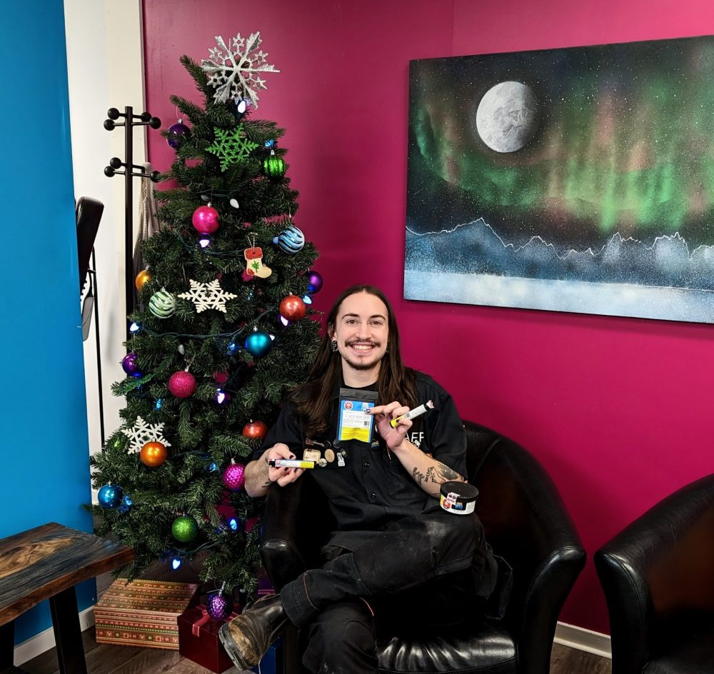 submitted
Chief operating officer Cylar Dunbar is ready for Christmas thanks to cannabis products shipped by Niverville’s Lineage Distribution to his Triple J’s Canna Space in Whitehorse.