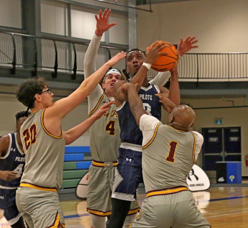 Emmanuel Oleko and the rest of the Providence bigs were constantly bothered by their smaller opponents throughout the game. (Cassidy Dankochik The Carillon)