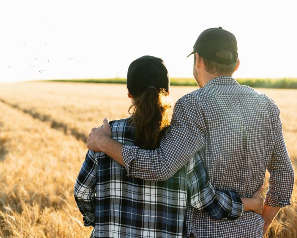 MANITOBA FARMER WELLNESS PROGRAM
A farm couple surveying a golden field of wheat is one of the images MFWP has selected for its website, saying “Mental Health Matters”.
