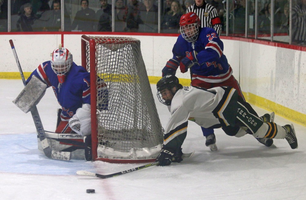 Teagan Fillion is knocked down while trying a wraparound shot during game one of the Capital Region Junior Hockey League finals. Fillion and the rest of the St Malo Warriors are down 2-0 to the Beausejour Comets. (Cassidy Dankochik The Carillon)