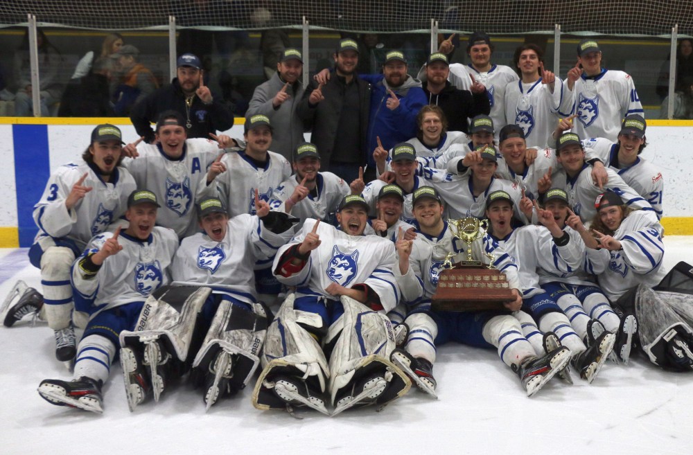 The Steinbach Huskies celebrate back-to-back HTJHL championships. (Cassidy Dankochik The Carillon)