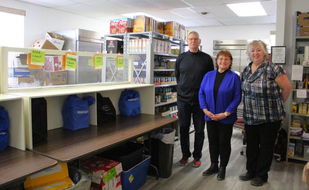 CHRIS GAREAU THE CARILLON
Lorette Thrifty Treasures vice president Allan Rau (left), Tache Food Resource Centre board member and volunteer coordinator Irene Bialek, and Lorette Thrifty Treasures president Suzanne Moore inside the organized but tight space for the food bank in the building they share and are expanding on Dawson Road.