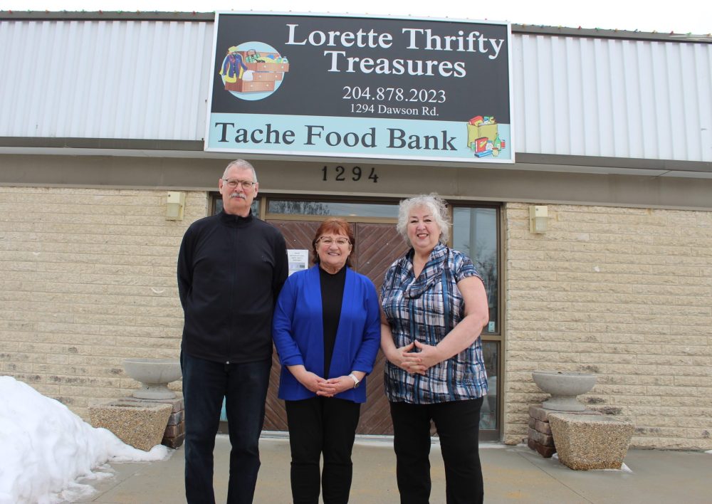 CHRIS GAREAU THE CARILLON
Lorette Thrifty Treasures vice president Allan Rau (left), Tache Food Resource Centre board member and volunteer coordinator Irene Bialek, and Lorette Thrifty Treasures president Suzanne Moore outside the building they share on Dawson Road.