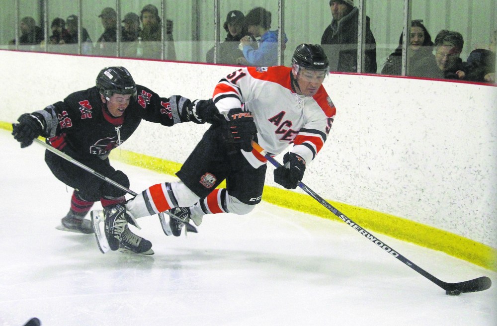 Harley Garrioch is tripped up as he looks to cycle the puck during the 2023 provincial senior final against Miniota/Elkhorn. Garrioch wasn't alone in falling flat for the Aces in game three, as the team fell behind 5-0 in the first period en route to losing the banner after winning game one. (Cassidy Dankochik Carillon Archives)