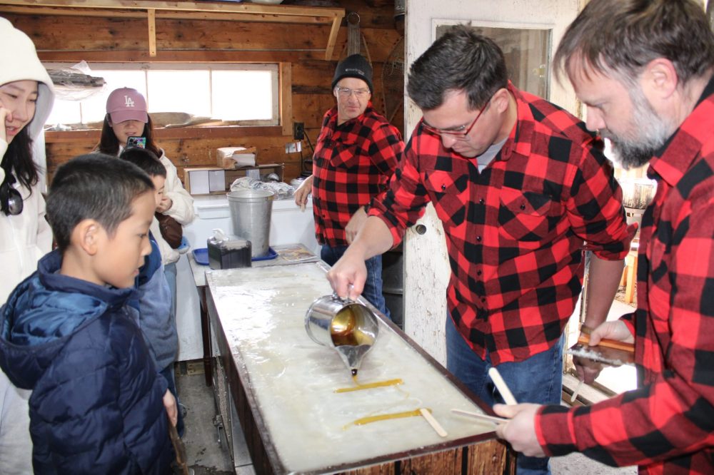 GREG VANDERMEULEN THE CARILLON
More than1,400 taffy-on-ice were served to visitors at the two-day Sugaring Off Festival.