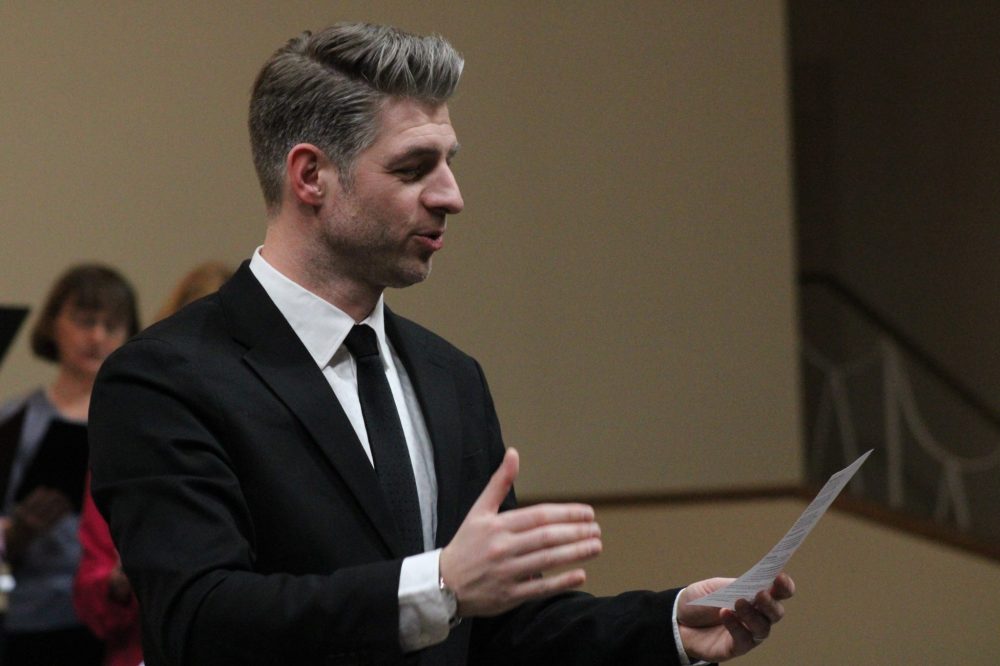 GREG VANDERMEULEN THE CARILLON
Eastman Choral Association Community Choir conductor Albert Bergen directs the audience during the event.