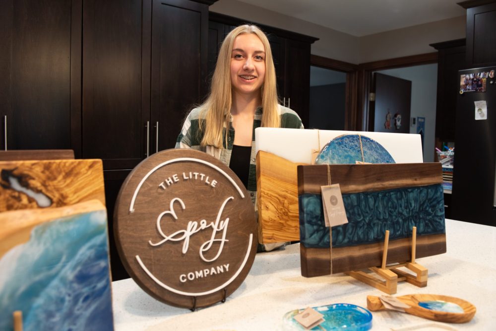 SVJETLANA MLINAREVIC THE CARILLON
Madison Enns stands next to some of the pieces from her company The Little Epoxy Company. Enns won second place and $750 at the first Steinbach Chamber Challenge.