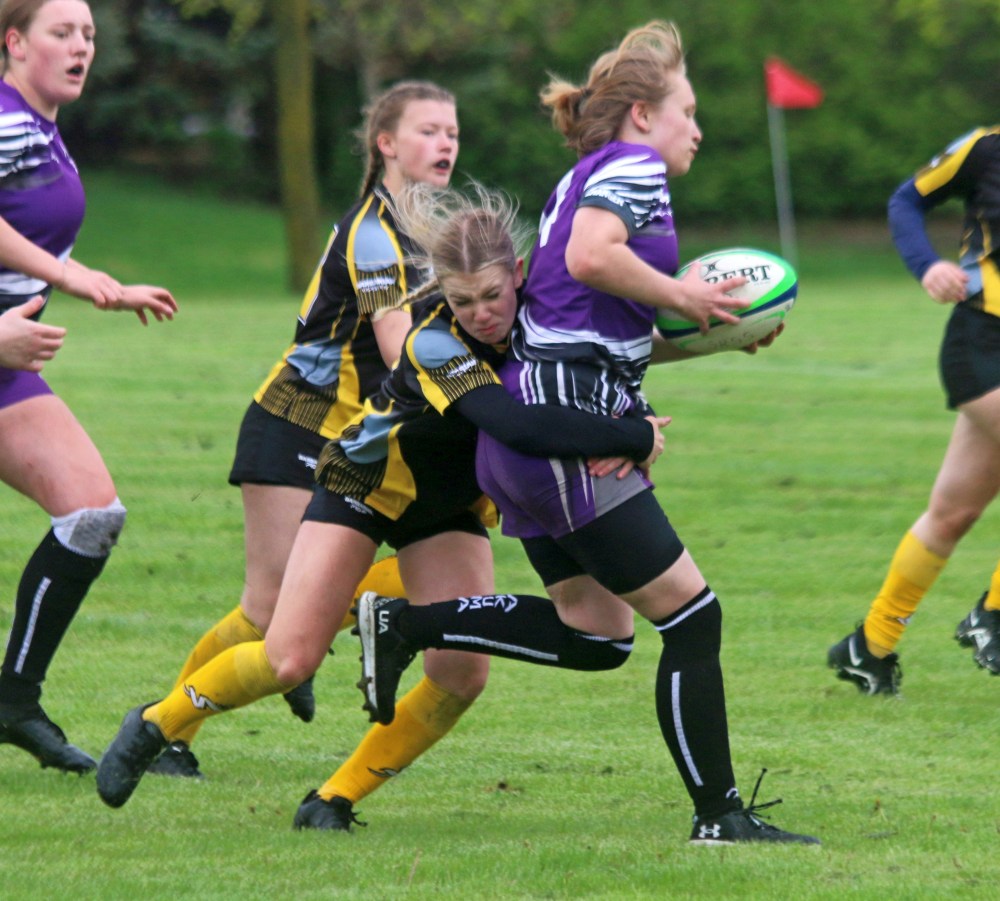 A Steinbach player goes for a tackle against Vincent Massey in the final of the Sabres' rugby tournament. (Cassidy Dankochik The Carillon)