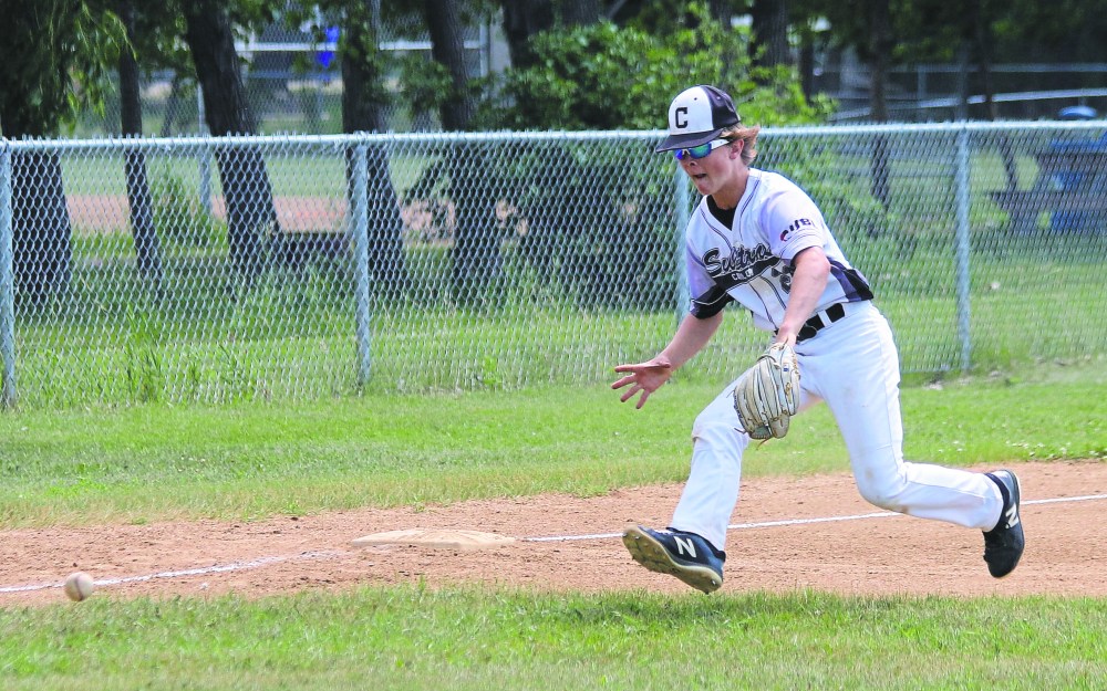 Graeme Pickering attempts a barehand play at third base. The St Adolphe multi-sport athlete was picked in the first round by the Red Deer Rebels during the 2024 WHL draft. (Cassidy Dankochik The Carillon)