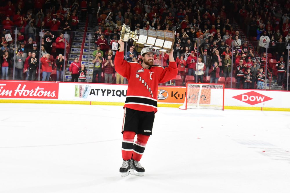 Dominion City's Denton Mateychuk celebrates with the Ed Chynoweth Cup. (Cory Bukauskas WHL)