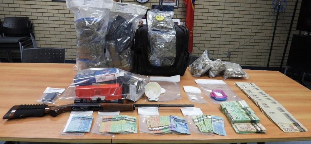 RCMP HANDOUT
RCMP display drugs, cash and a firearm seized from a Steinbach home.