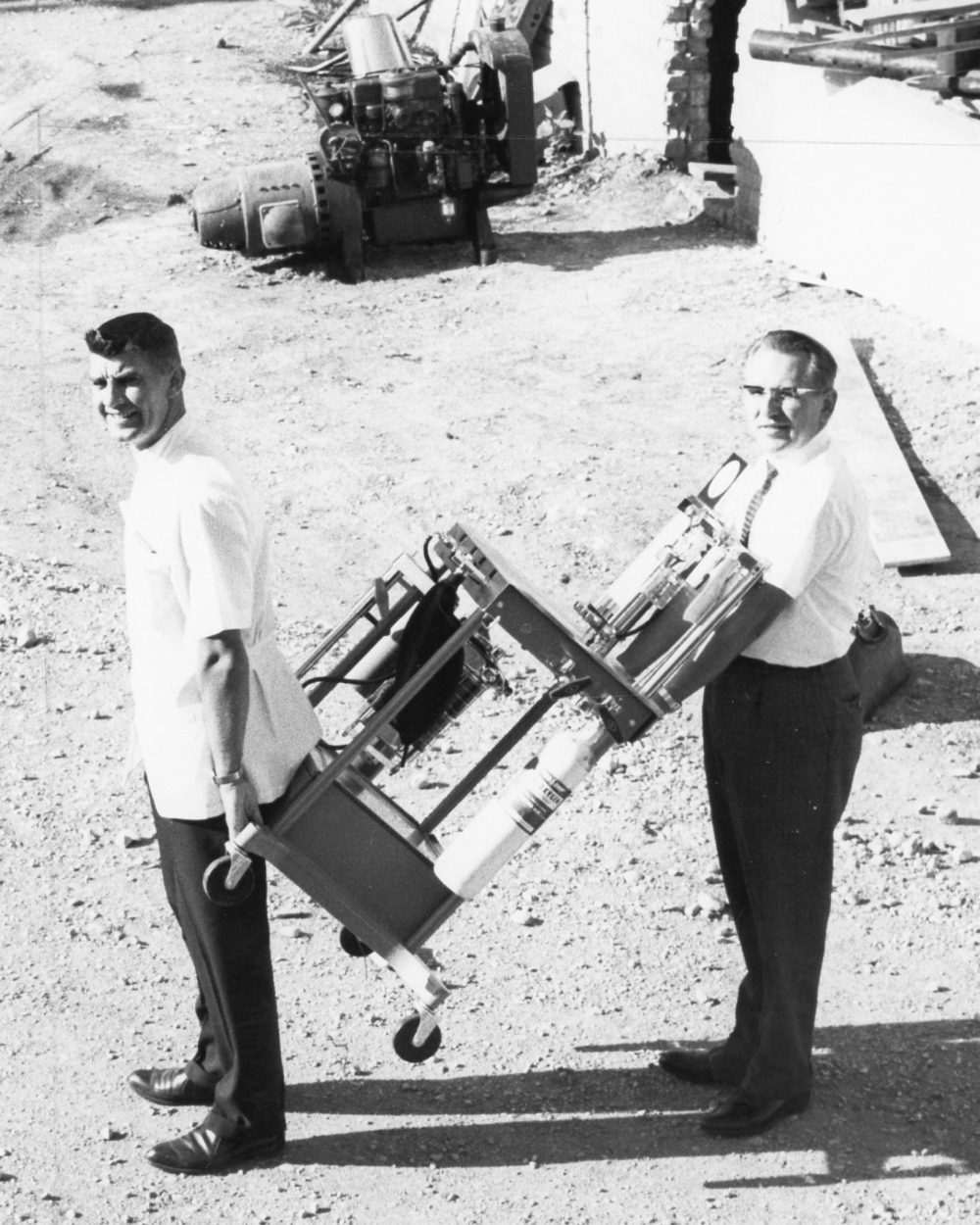 CARILLON ARCHIVES
Everybody, including Dr Paul Peters and Dr Victor Dick, pitched in to help with the move to the new Bethesda Hospital. The Carillon News snapped a photo of the two doctors carrying a piece of the hospital’s anesthetic equipment on its way to the new operating room.