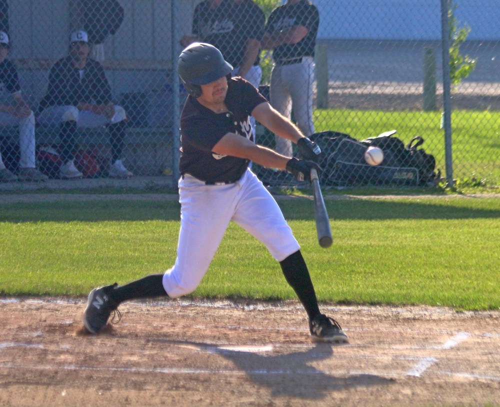 A Sultans hitter makes contact with a pitch during the team's victory over West Winnipeg June 13. (Cassidy Dankochik The Carillon)