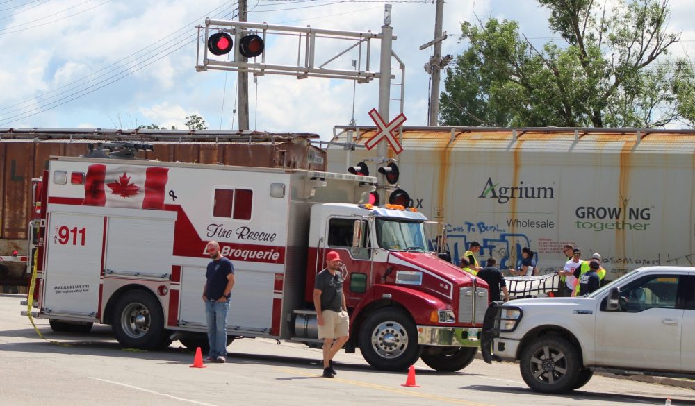 CHRIS GAREAU THE CARILLON
First responders and investigators at the scene of the fatal train collision in La Broquerie June 23.