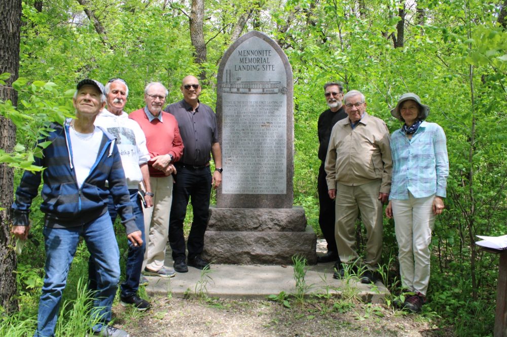 GREG VANDERMEULEN THE CARILLON
Left, Werner Dick and Gerry Lagasse of the St Adolphe Friendship Trail, EastMenn Historical Committee chair Glen Klassen, Christian Mennonite Conference Vice Bishop Rev. Sam Doerksen, EastMenn secretary Ernest Braun, retired SBC president Harvey Plett and Delores Thiel of the Crow Wing Trail Association pose for a photo at the monument recognizing the Mennonite Landing that was placed in 1994.