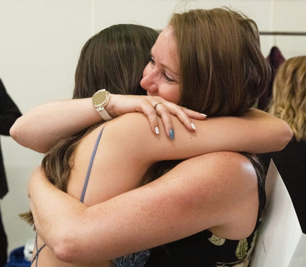 SVJETLANA MLINAREVIC THE CARILLON
Landmark Collegiate graduate Martini Reid gets a big hug from her teary-eyed mom Crystal Czechmeister on June 26, 2024, at Prairie Rose Evangelical Mennonite Church.