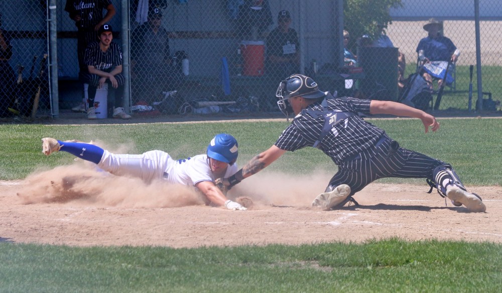 Cody Gunderson's close tag at home flipped game two of the Manitoba Junior Baseball League quarterfinals. (Cassidy Dankochik The Carillon)
