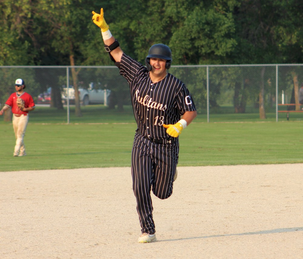 Mason Hartung's grand slam in the fourth inning of game five put the championship out of reach. (Alex Lambert The Carillon)