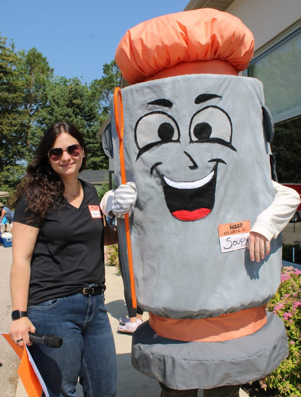 GREG VANDERMEULEN THE CARILLON
Kari Bachmeier stands with Soup's On new mascot, Soupy, a character she created.
