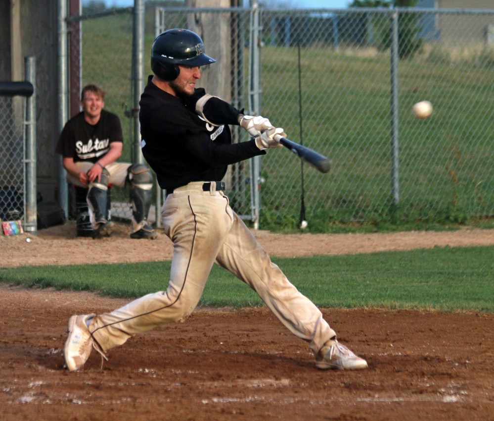 Yanykk Nadeau makes contact during Winnipeg Senior Baseball League playoff action at Charleswood Place Aug. 8. (Cassidy Dankochik The Carillon)