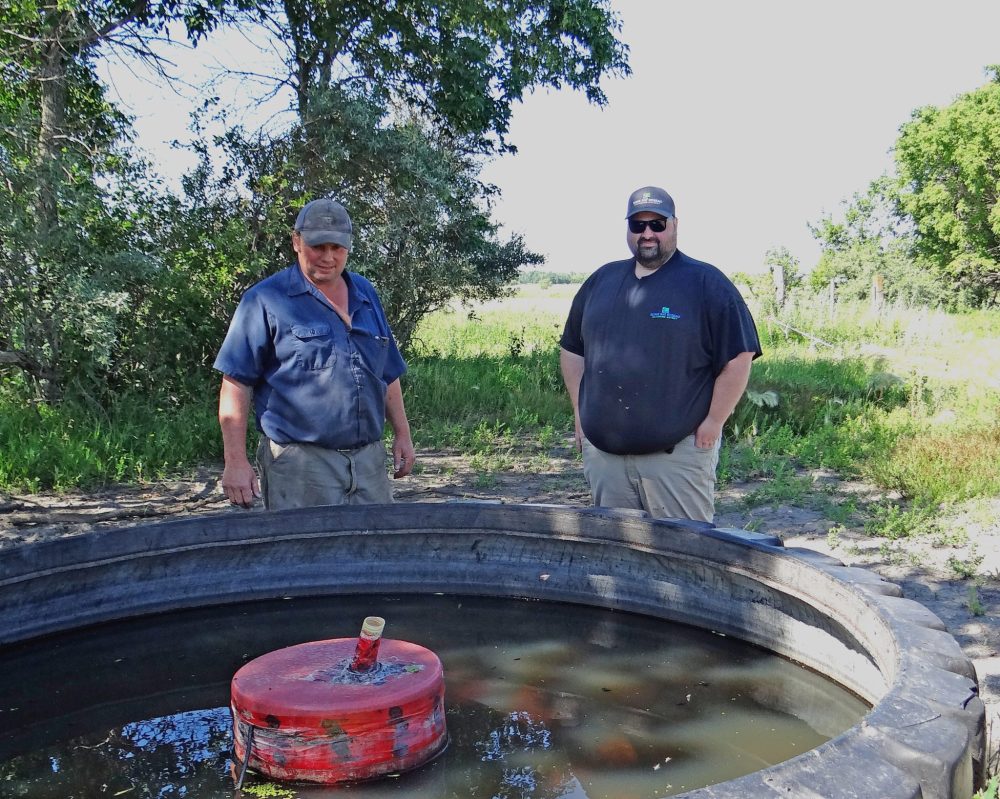WES KEATING THE CARILLON
Neil Claringbould and Joey Pankiw explain the benefits of a portable watering system that uses a huge mining truck recycled tire as a trough.