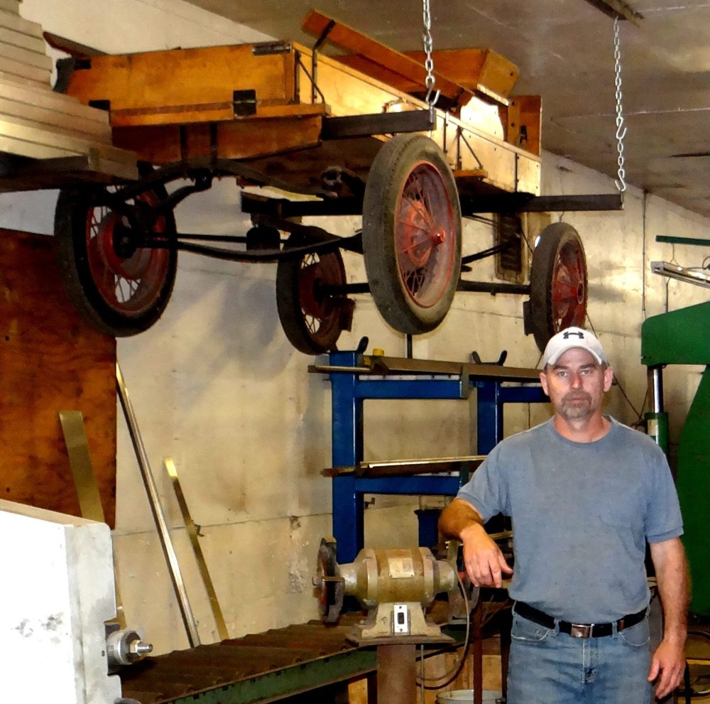 WES KEATING THE CARILLON
A wagon suspended from the shop ceiling is ready for the next time Corey Penner finds time to hitch up the team of Clydesdales.