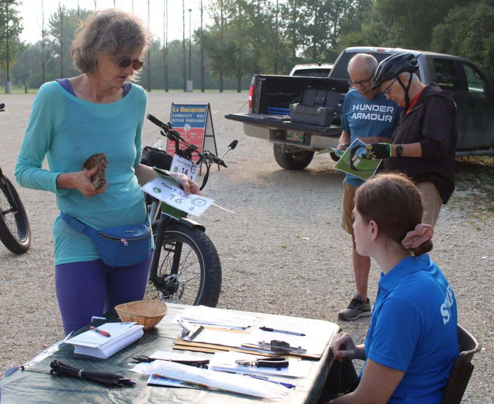 GREG VANDERMEULEN THE CARILLON
Delores Thiel, who works with the Crow Wing Trail, registers at the Peace Trek.