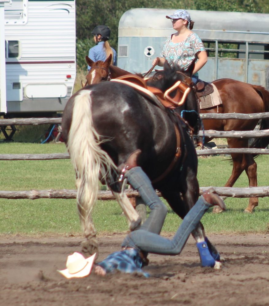 GREG VANDERMEULEN THE CARILLON
Cowgirls are tough. Cassey may have been bucked into the dirt, but she popped up and walked out under her own power.