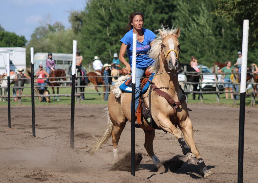 GREG VANDERMEULEN THE CARILLON
Steinbach area rider Becky Garris guides Stealth through the poles.