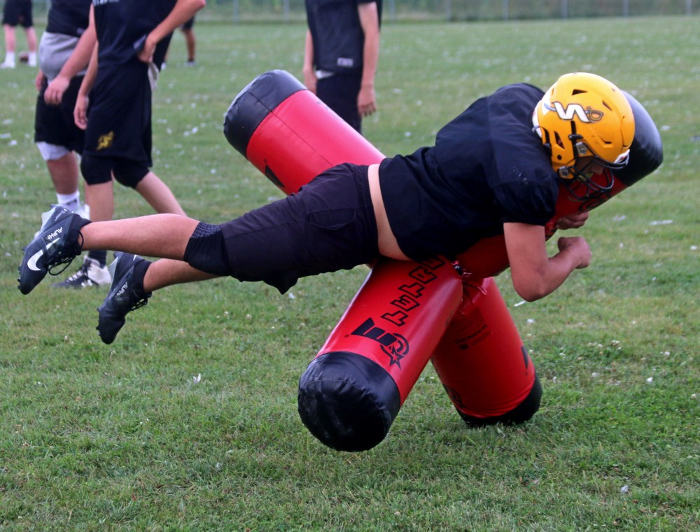 It was clear the SRSS Sabres were having an intense practice Aug. 26, as their brand new Tetra Tackling dummy broke after a hard hit. (Cassidy Dankochik The Carillon)