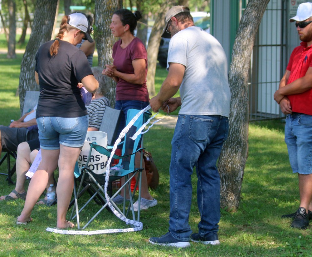 The 50/50 tickets were flowing throughout the day at Raiders Day. (Cassidy Dankochik The Carillon)