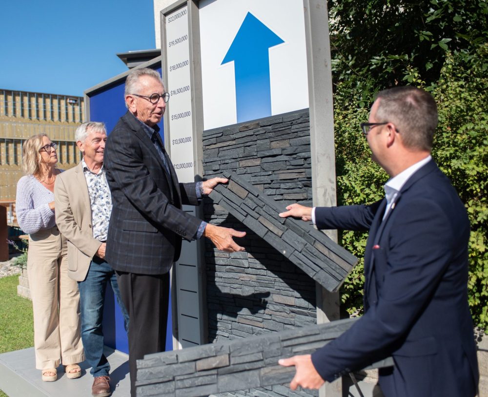 SVJETLANA MLINAREVIC THE CARILLON
Bethesda Foundation chair Chris Goertzen gives a brick to Waldo Neustaedter to place on the donation wall at the Healing Garden at Bethesda Regional Health Centre on Sept. 24. The foundation has a goal of raising $22 million for its capital projects in the re-launching of the Caring Together campaign. To date, the campaign has garnered $16 million.