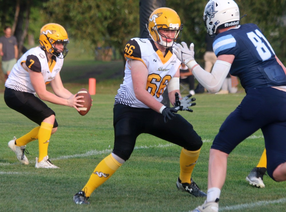 The SRSS Sabres Varsity football team battled with last year's league finalists Grant Park Sept. 12 at A.D. Penner Park in Steinbach. (Cassidy Dankochik The Carillon)