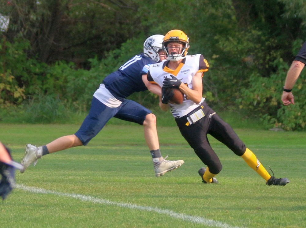 The SRSS Sabres Varsity football team battled with last year's league finalists Grant Park Sept. 12 at A.D. Penner Park in Steinbach. (Cassidy Dankochik The Carillon)