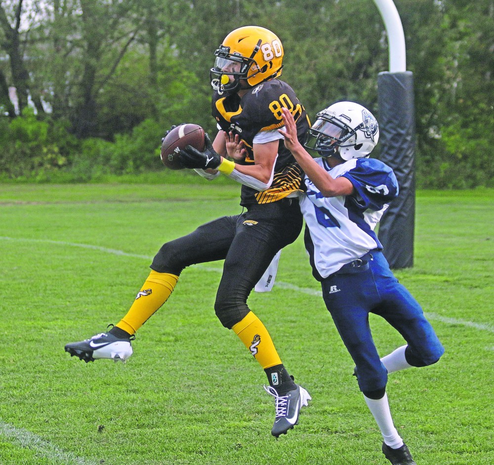 Owen Medeiros caught two long touchdown passes from Arkin Padron to help power the junior varsity Sabres over the Grant Park Pirates in Winnipeg High School Football League 9-player division action in A.D. Penner Park Sept. 11. (Cassidy Dankochik The Carillon)
