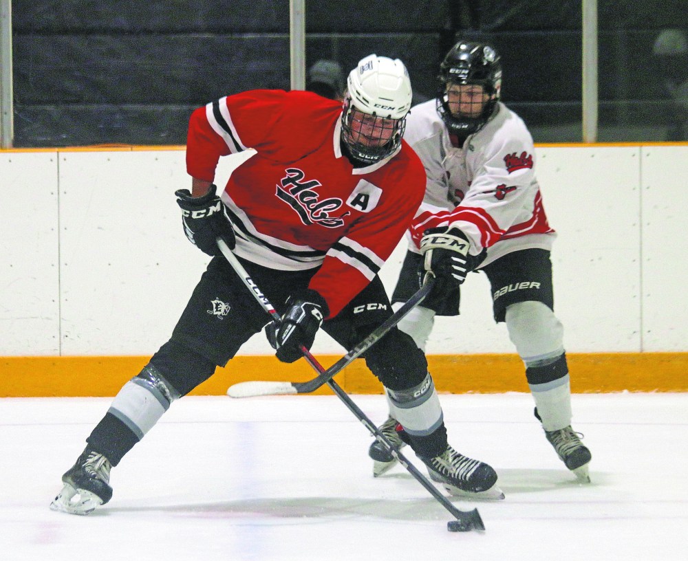 Players got a preview of what it will be like when they take to the ice for real, borrowing La Broquerie's old senior team jerseys for the scrimmage. (Cassidy Dankochik The Carillon)