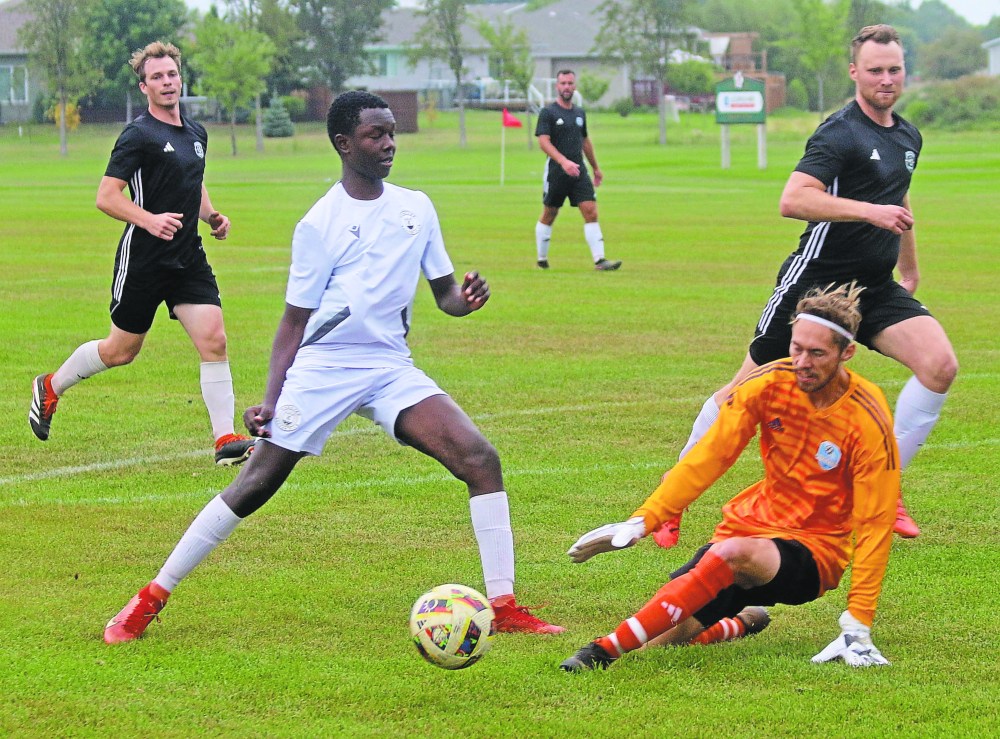Niverville's goalkeeper makes a nice save as Hanover presses in the second-to-last game of the season in Steinbach Soccer Park Sept. 11. (Cassidy Dankochik The Carillon)