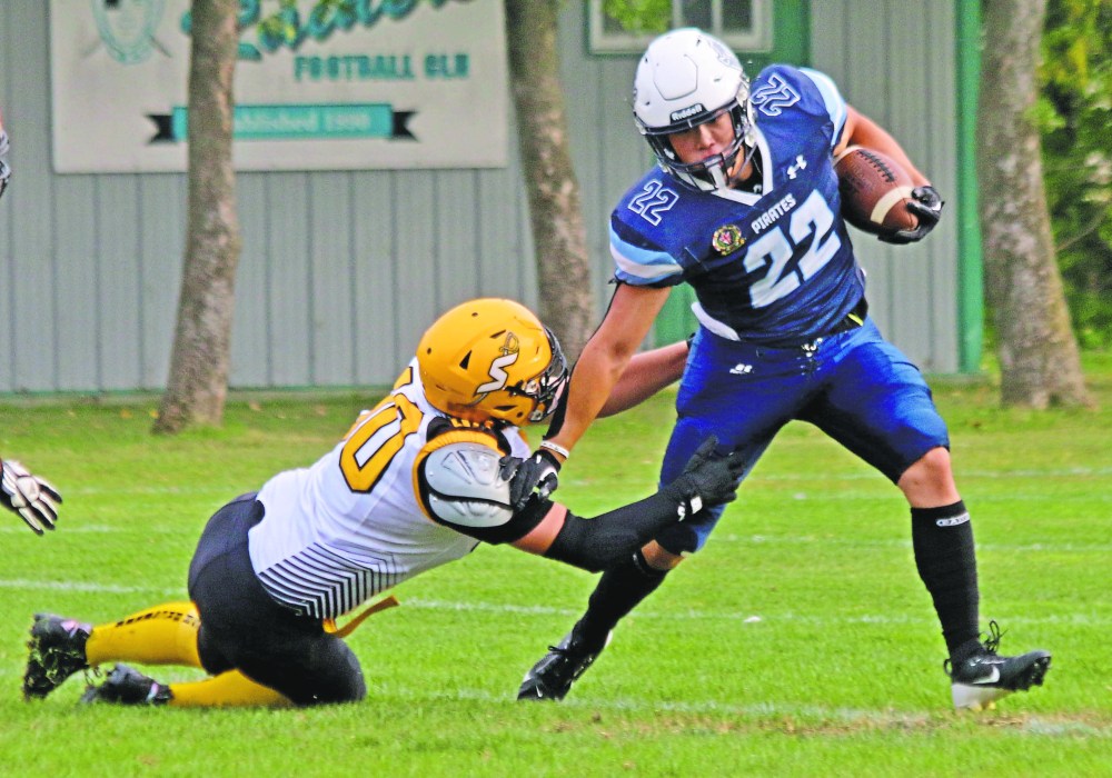 Grant Park ran right over Steinbach in the second half, simplifying their offensive gameplan and using their superior size and strength to grind Steinbach down. The Pirates turned a 14-14 tie into a 35-14 comfortable victory at A.D. Penner Park Sept. 12. (Cassidy Dankochik The Carillon)