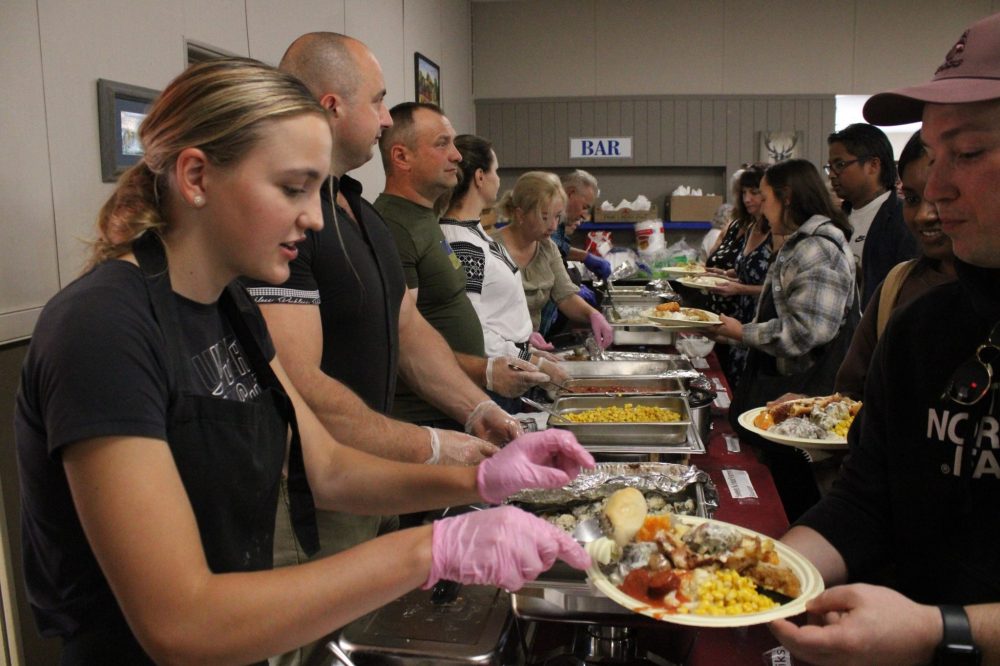 Hailey Germain adds to an already overflowing plate as Pansy kicked off the fall supper season on Sunday.