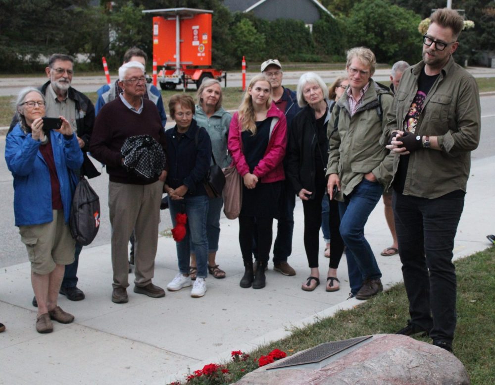 GREG VANDERMEULEN THE CARILLON
Andrew Unger reads the plaque to the gathered guests.