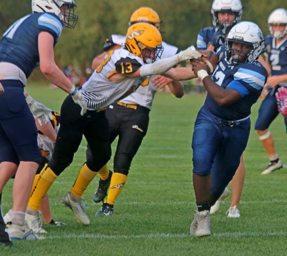 The SRSS Sabres Varsity football team battled with last year's league finalists Grant Park Sept. 12 at A.D. Penner Park in Steinbach. (Cassidy Dankochik The Carillon)
