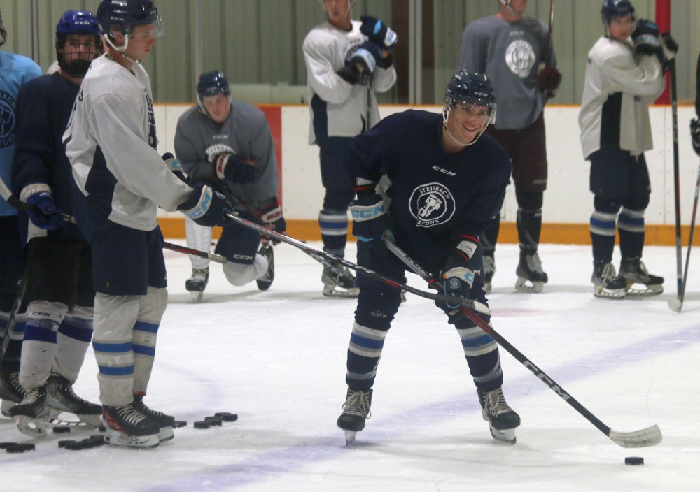 A Steinbach Pistons player flashes a smile during drills inside the T.G. Smith Centre at a pre-camp skate Aug. 28. The Pistons officially began their training camp Sept. 2. (Cassidy Dankochik The Carillon)